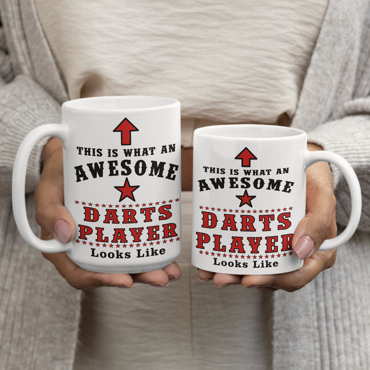 Awesome Darts Player mug shown in 15oz and 11oz sizes held side by side, comparing large and standard mug options