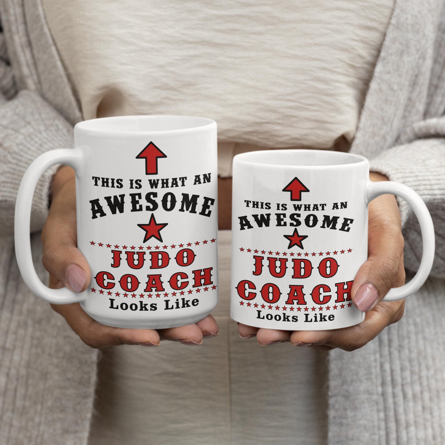 15oz and 11oz Awesome Judo Coach mugs held side by side showing size comparison