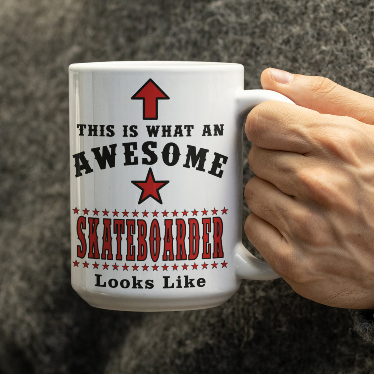 Hand holding white 15oz mug printed with This is what an Awesome Skateboarder looks like design