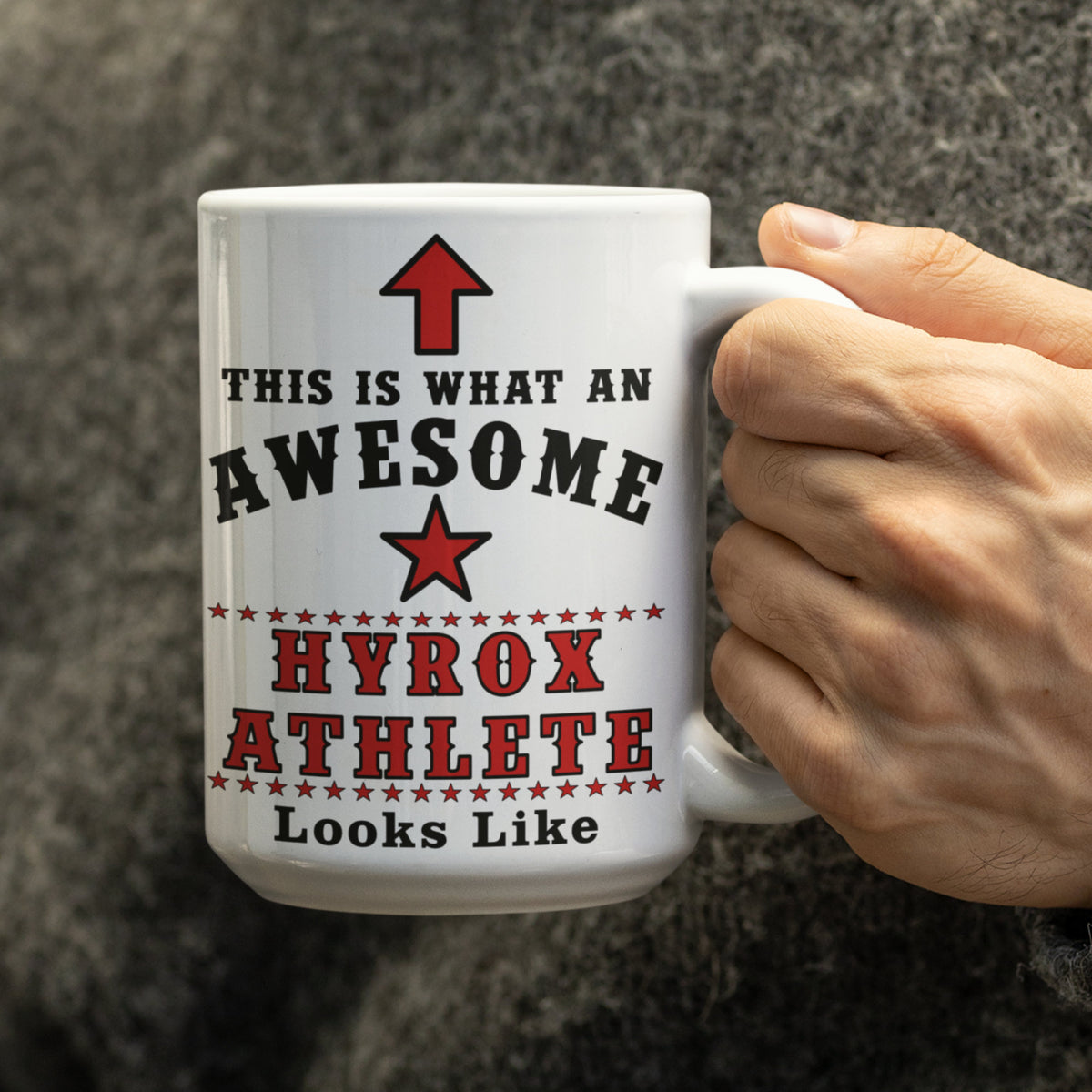 15oz Hyrox Athlete mug held in hand showing "This is what an awesome Hyrox athlete looks like" text