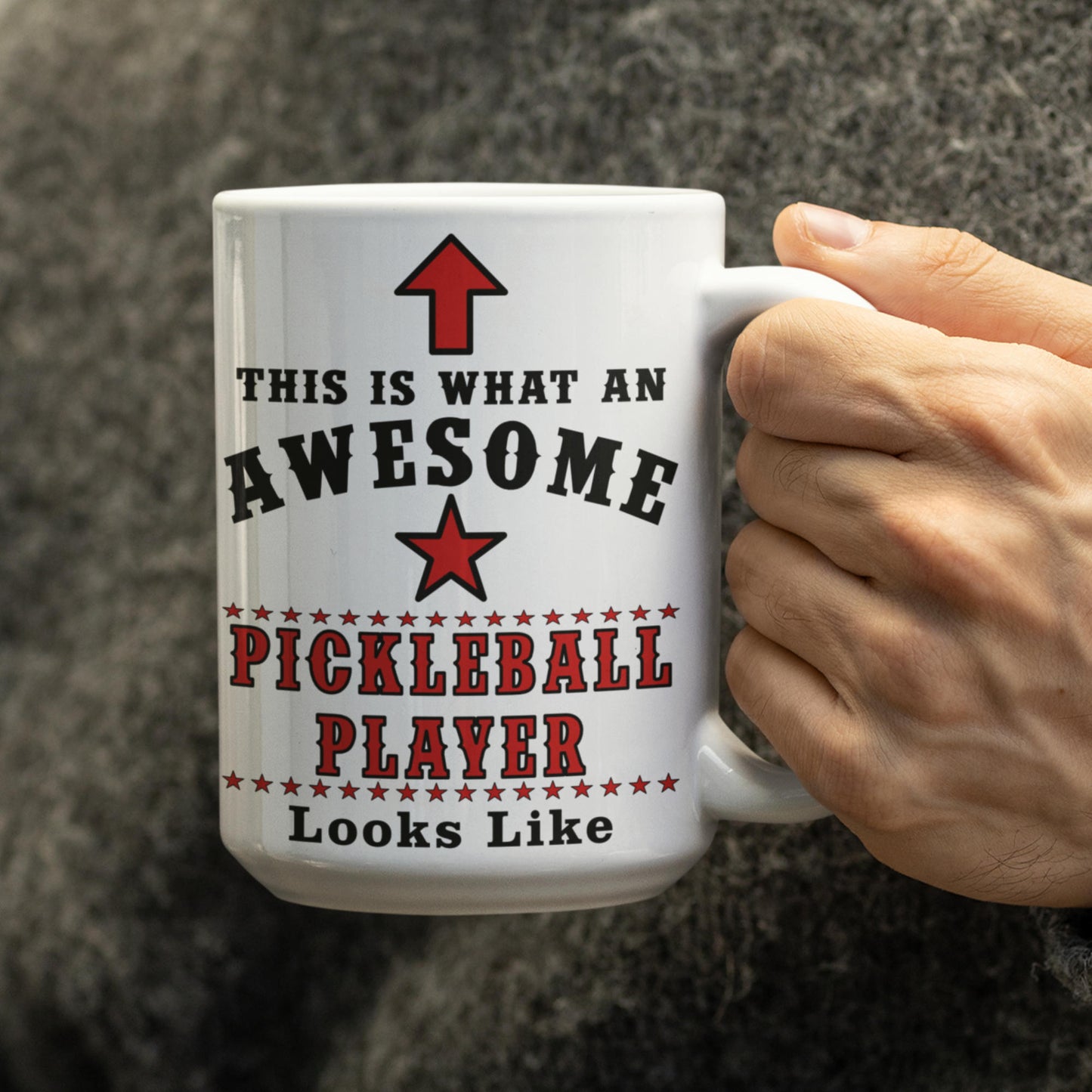 Close up of 15oz Pickleball Player mug held in hand
