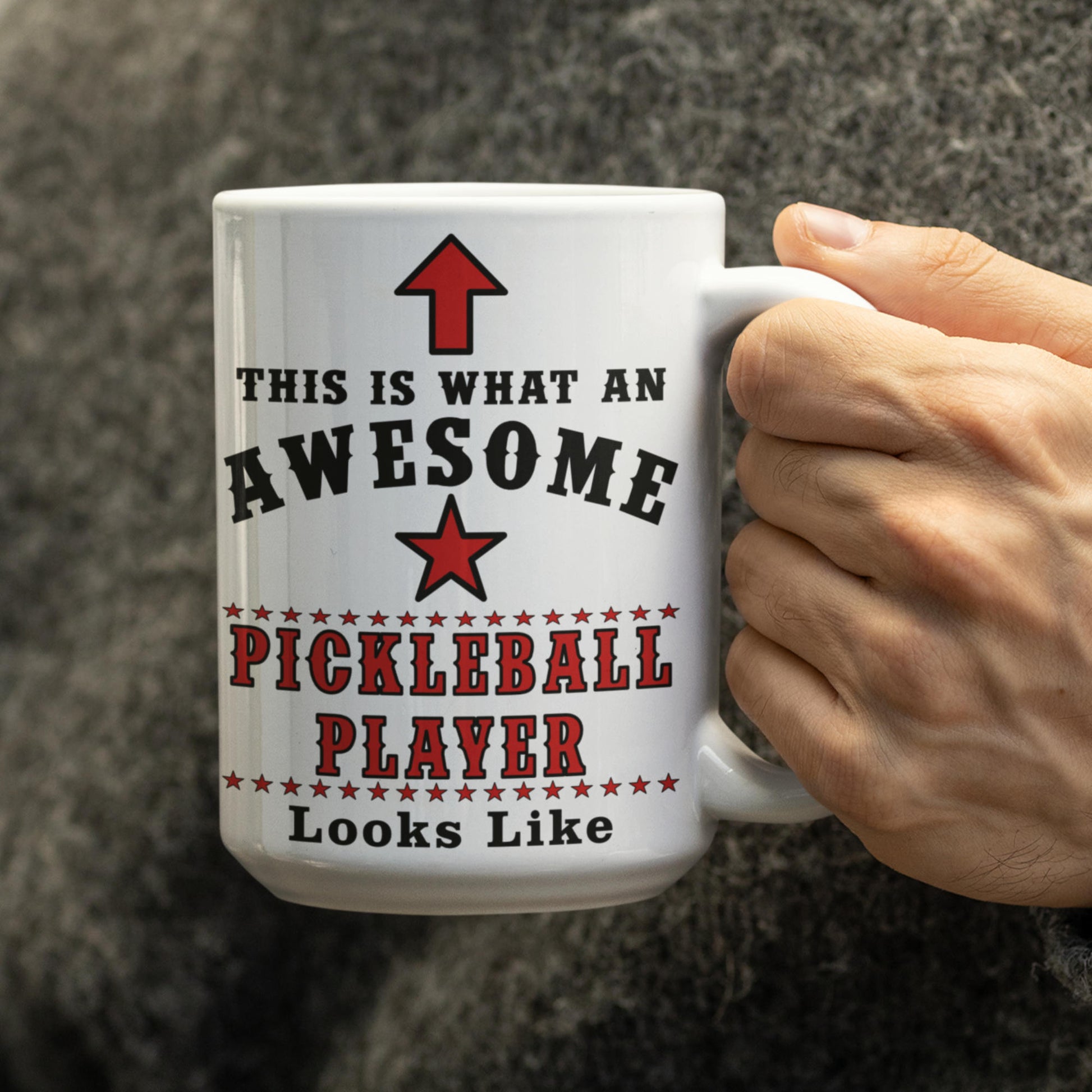 Close up of 15oz Pickleball Player mug held in hand
