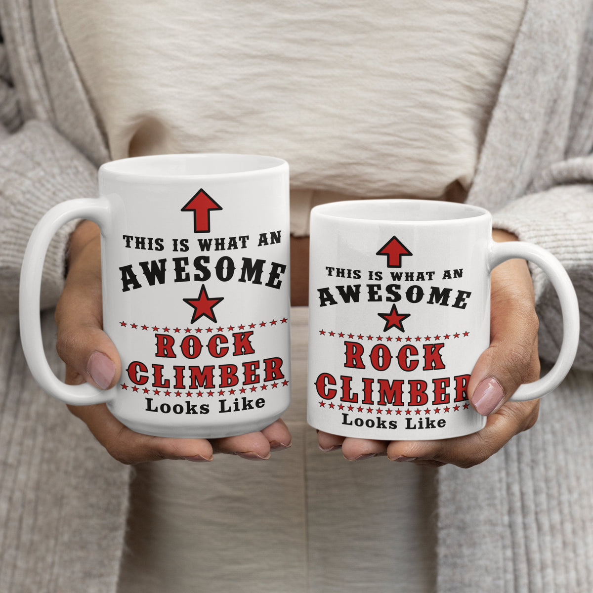 Two "This Is What An Awesome Rock Climber Looks Like" mugs, 15oz and 11oz size comparison, held by a person